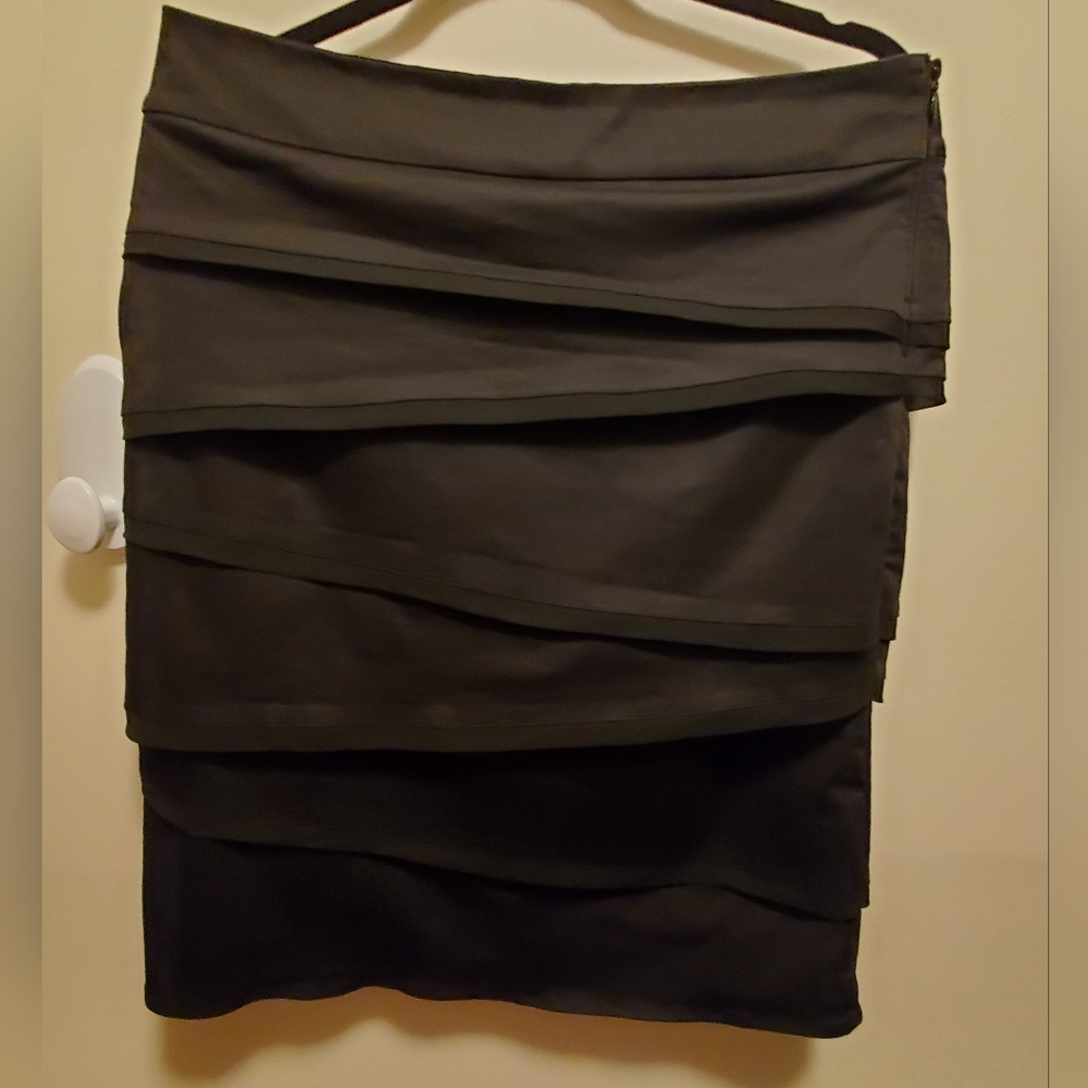 White House Black Market size 10 straight,  Asymmetrically layered Black Skirt